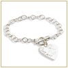 Silver toggle bracelet with engraved heart charm