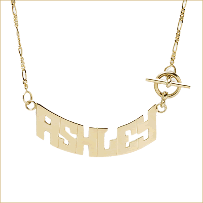 Gold toggle necklace with block nameplate 