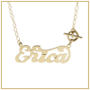 Gold toggle necklace with script nameplate with tails
