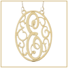 Gold oval scroll initial monogram pendant