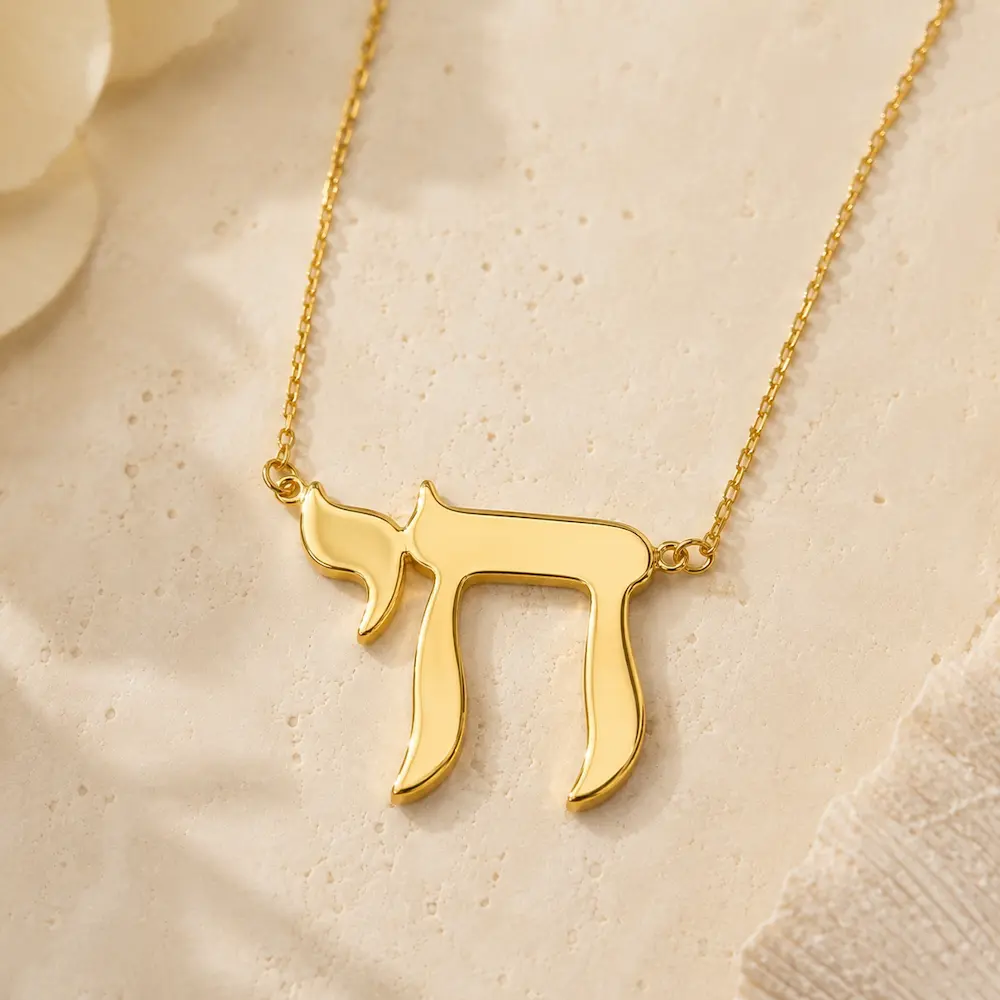 Gold Chai necklace religious symbol meaning to life